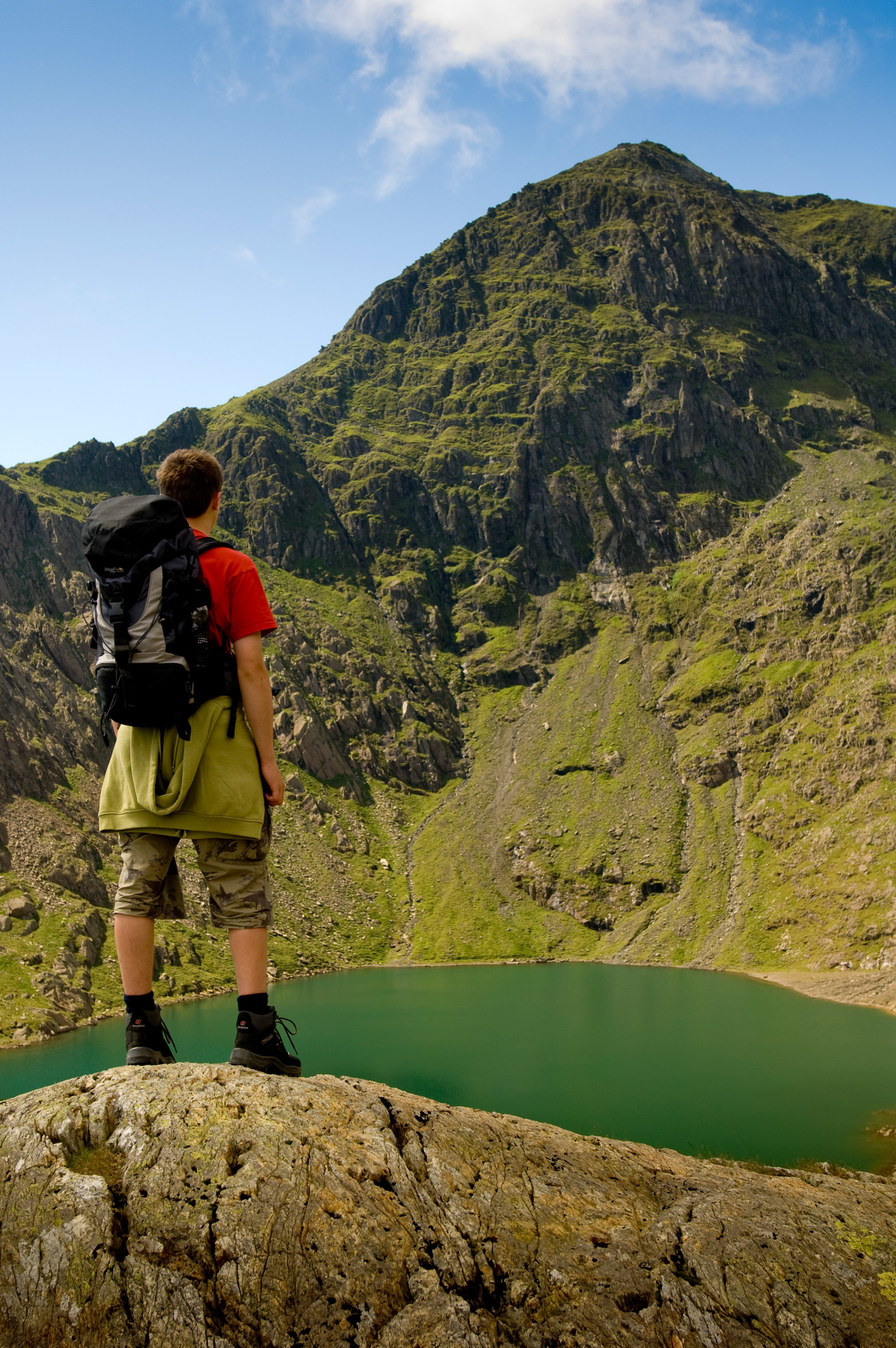 Including a foreground element provide a sense of scale and perspective.