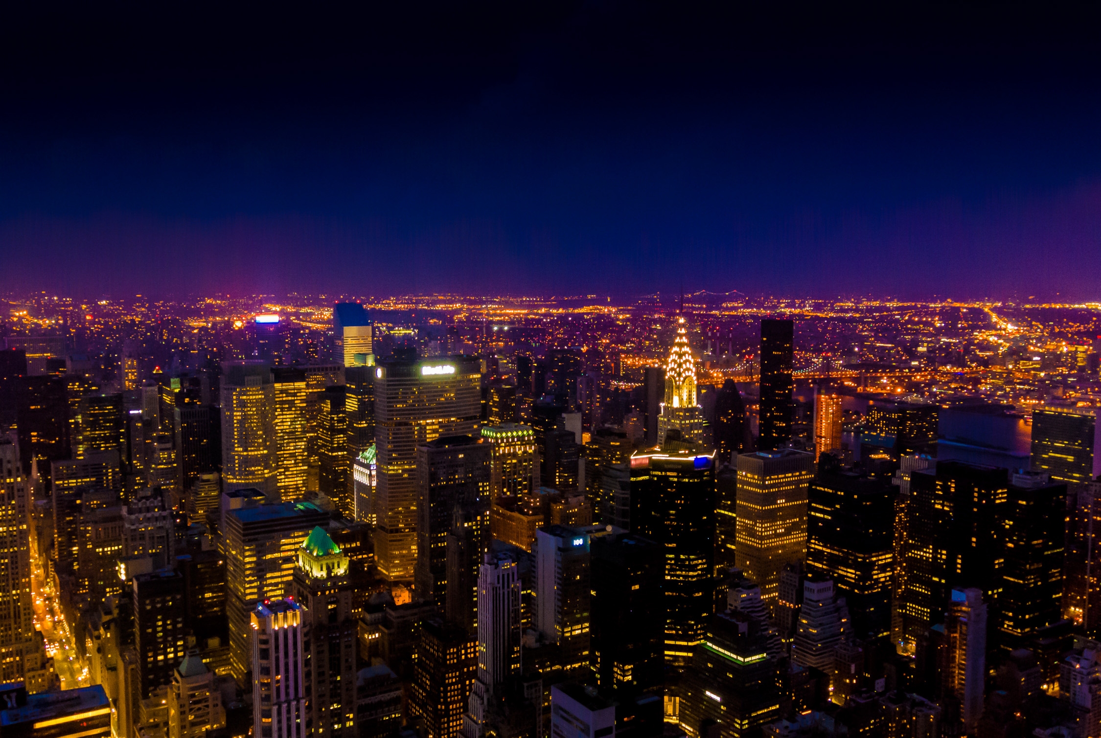 New York city shot at night through glass.