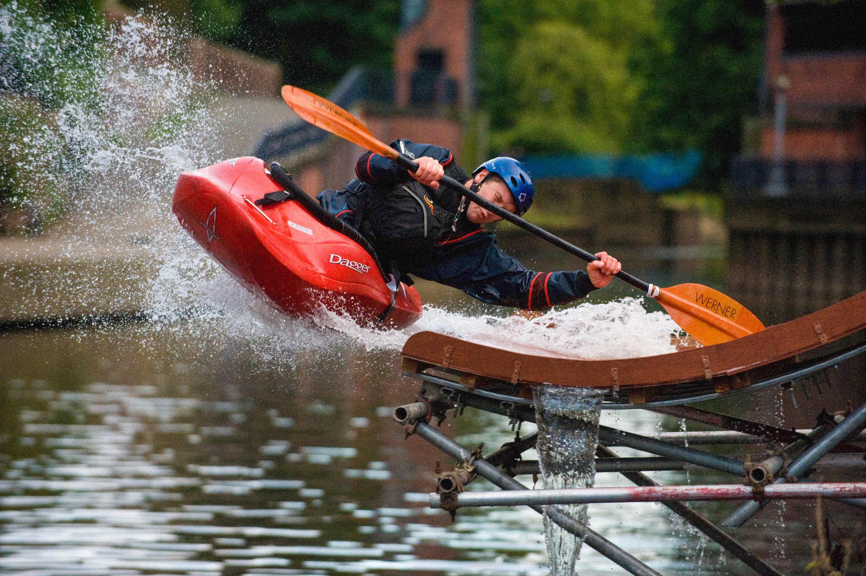 Airborne kayaker action shot.
